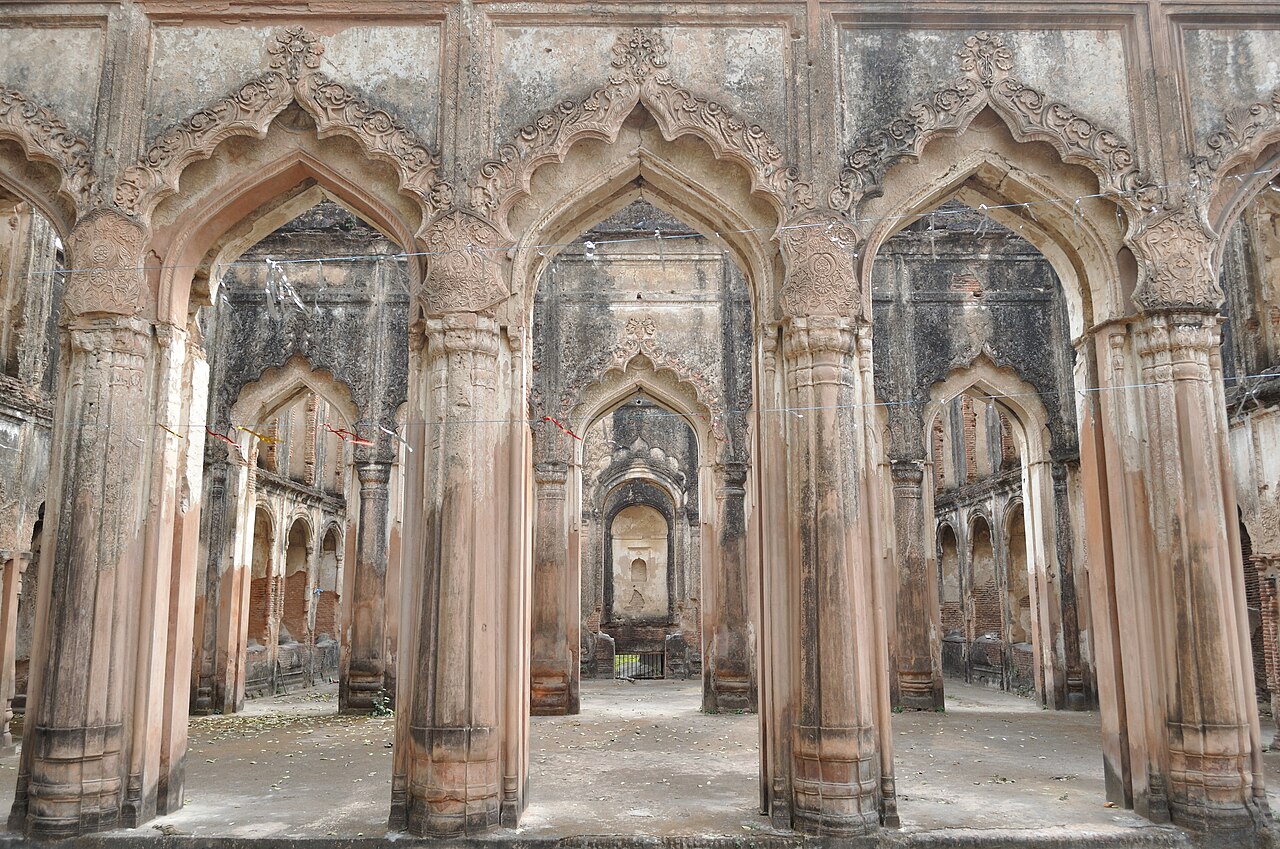 Historic brick ruins and lawns at the British Residency in Lucknow.